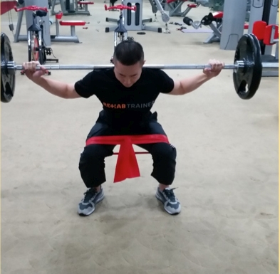 Figure 6: Banded squats to minimise AM involvement